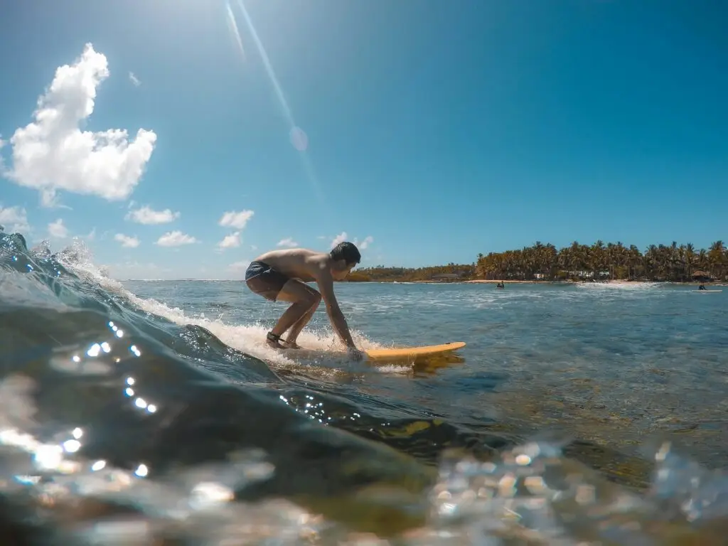 Palm-lined surf beach in Siargao, Philippines