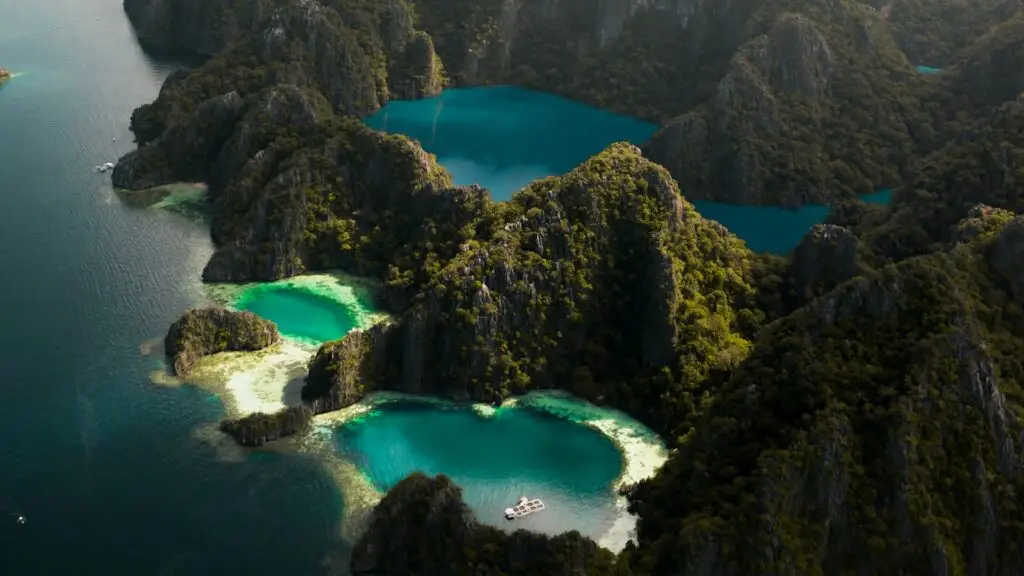 Aerial view of Barracuda Lake on Coron Island, Palawan, ringed by limestone ridges