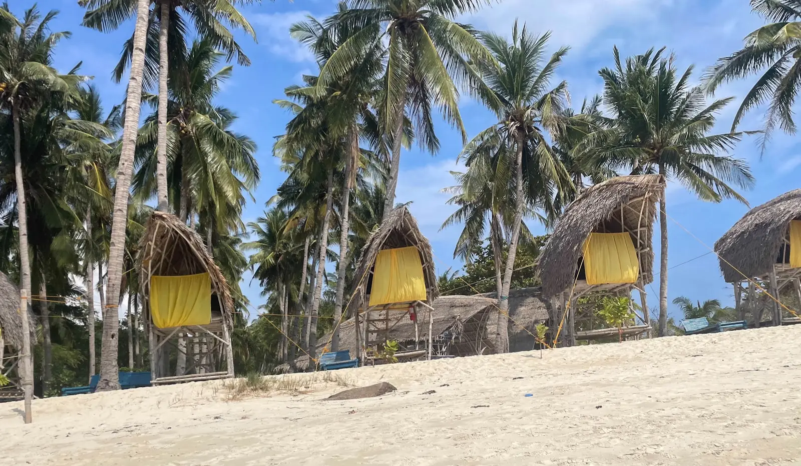 Thatched nipa huts on Nacpan Beach El Nido Palawan Philippines