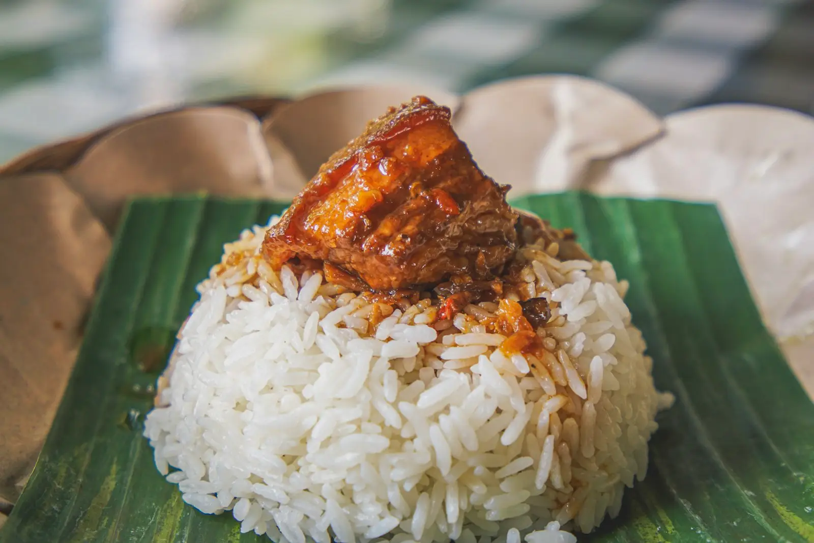 Steamed rice with Filipino adobo pork, a typical affordable local meal